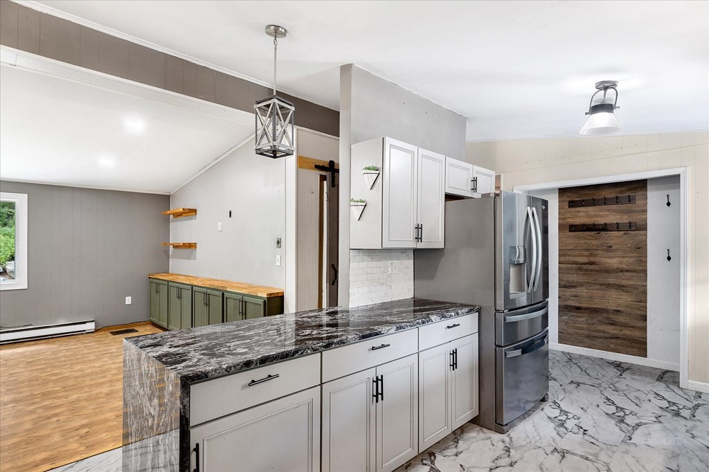 47 Barnes Road North Brookfield, MA 01535 - Photo 8 of 37 a kitchen with stainless steel appliances granite countertop a sink and refrigerator