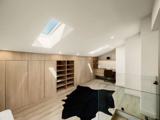 a bathroom with a double vanity sink toilet and shower