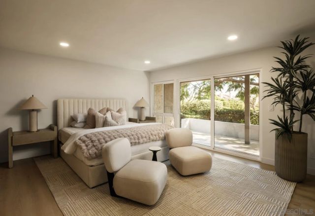 a spacious bedroom with a large bed and a large window