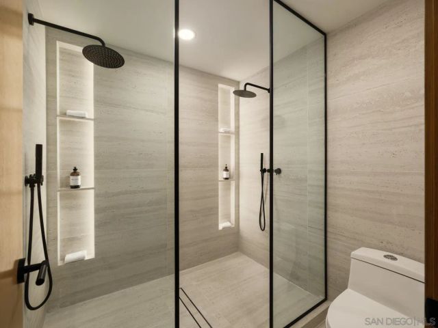 a bedroom with a bed and a furniture