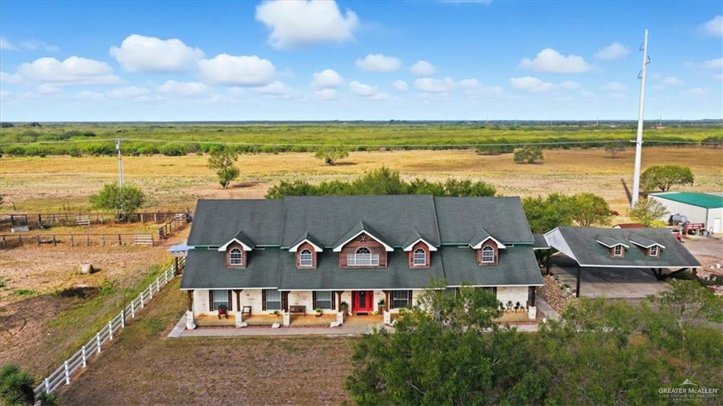 15561 Highway 281 Premont, TX 78375 - Photo 1 of 43 swimming pool with an outdoor seating and a garden