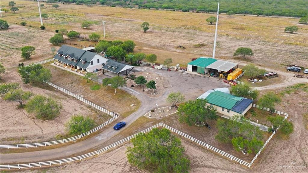 15561 Highway 281 Premont, TX 78375 - Photo 15 of 43 an aerial view of residential houses with outdoor space