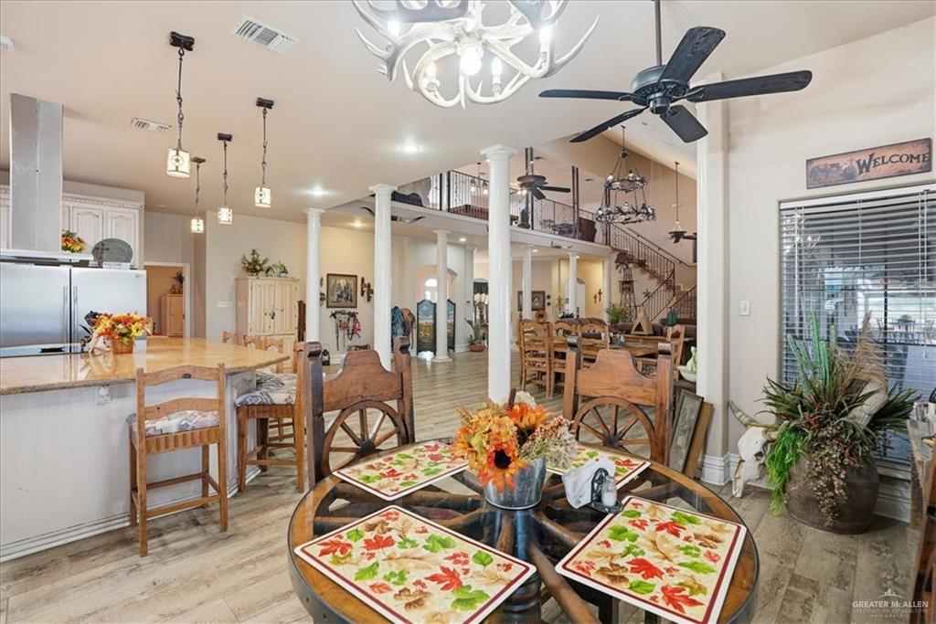 15561 Highway 281 Premont, TX 78375 - Photo 37 of 43 a living room with lots of furniture and view of kitchen
