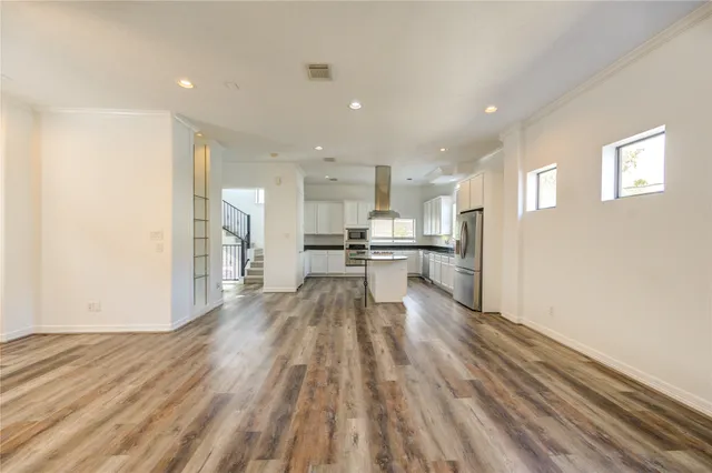 a view of kitchen with wooden floor