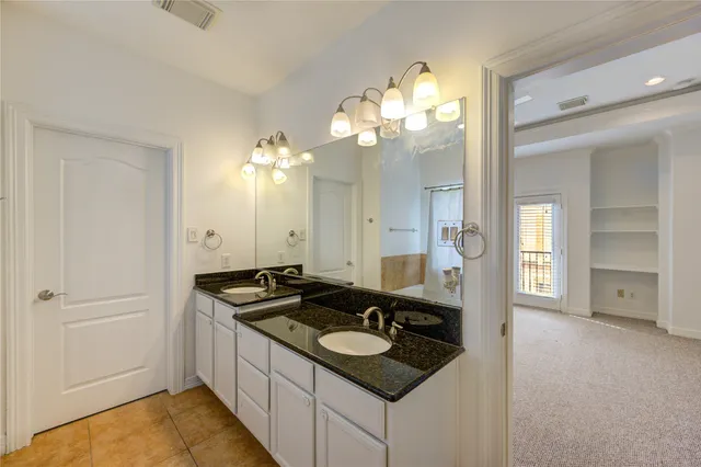 a kitchen with a sink and stove