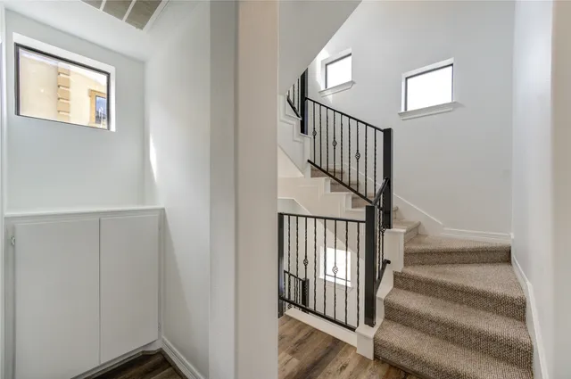 a view of entryway with wooden floor
