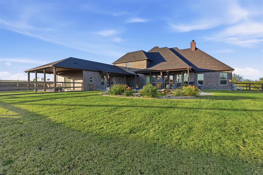 6298 Belz Road Sanger, TX 76266 - Photo 33 of 40 a front view of a house with garden