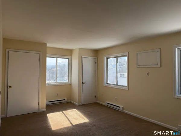 an empty room with windows