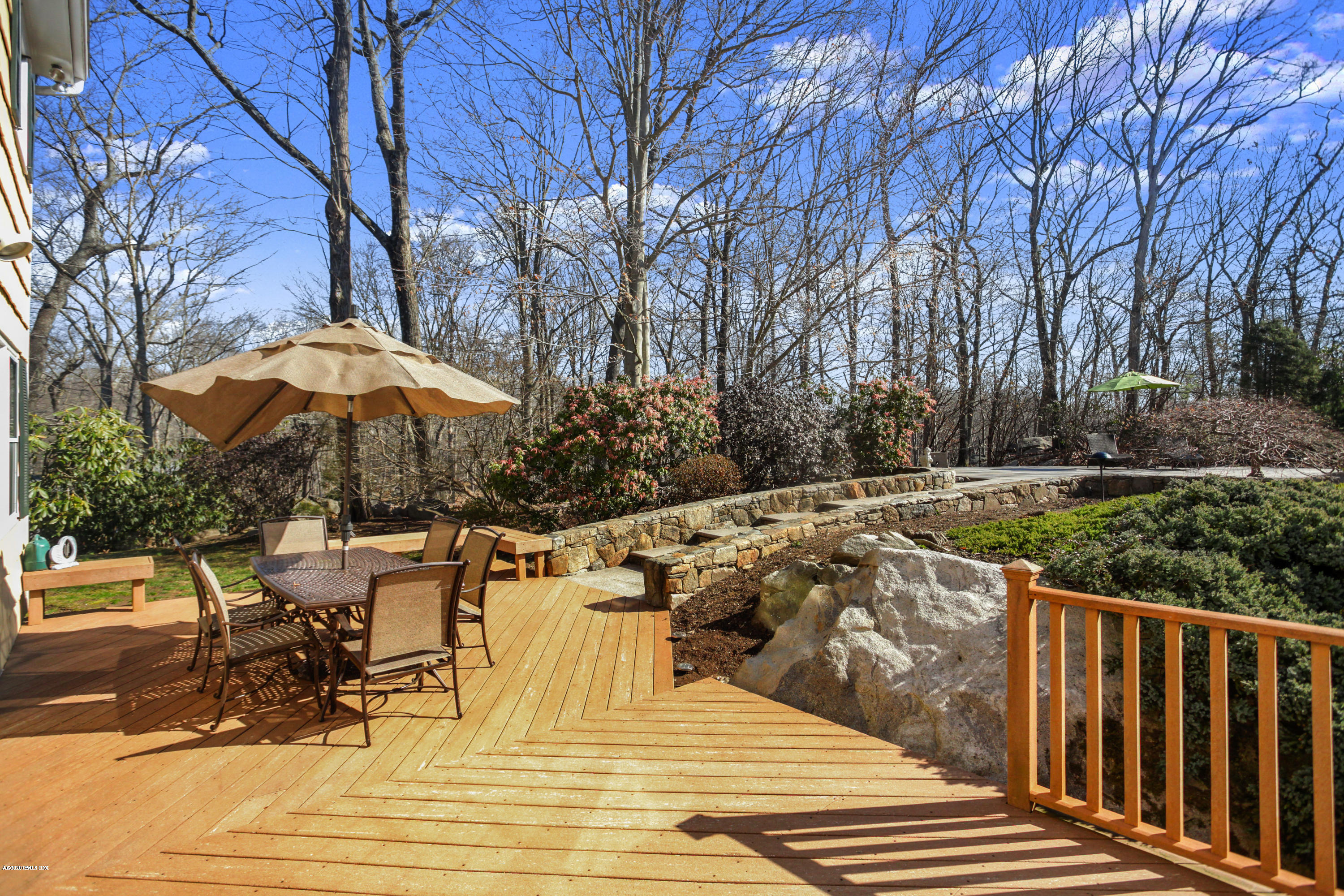 31 Horseshoe Road Cos Cob, CT 06807 - Photo 24 of 34 deck with table and chairs