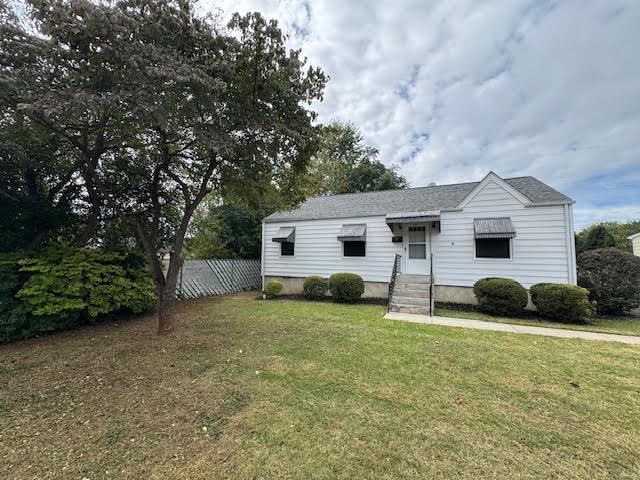4916 Hildebrand Road Northwest Roanoke, VA 24012 - Photo 1 of 24 a view of a house with a yard