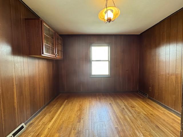 4916 Hildebrand Road Northwest Roanoke, VA 24012 - Photo 13 of 24 a view of an empty room with wooden floor and a window