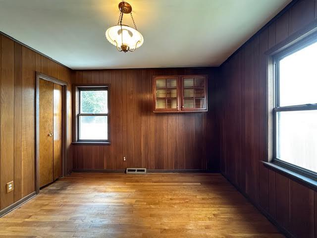 4916 Hildebrand Road Northwest Roanoke, VA 24012 - Photo 16 of 24 an empty room with wooden floor and windows