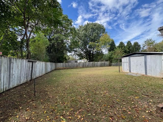 4916 Hildebrand Road Northwest Roanoke, VA 24012 - Photo 22 of 24 a backyard of a house with lots of green space
