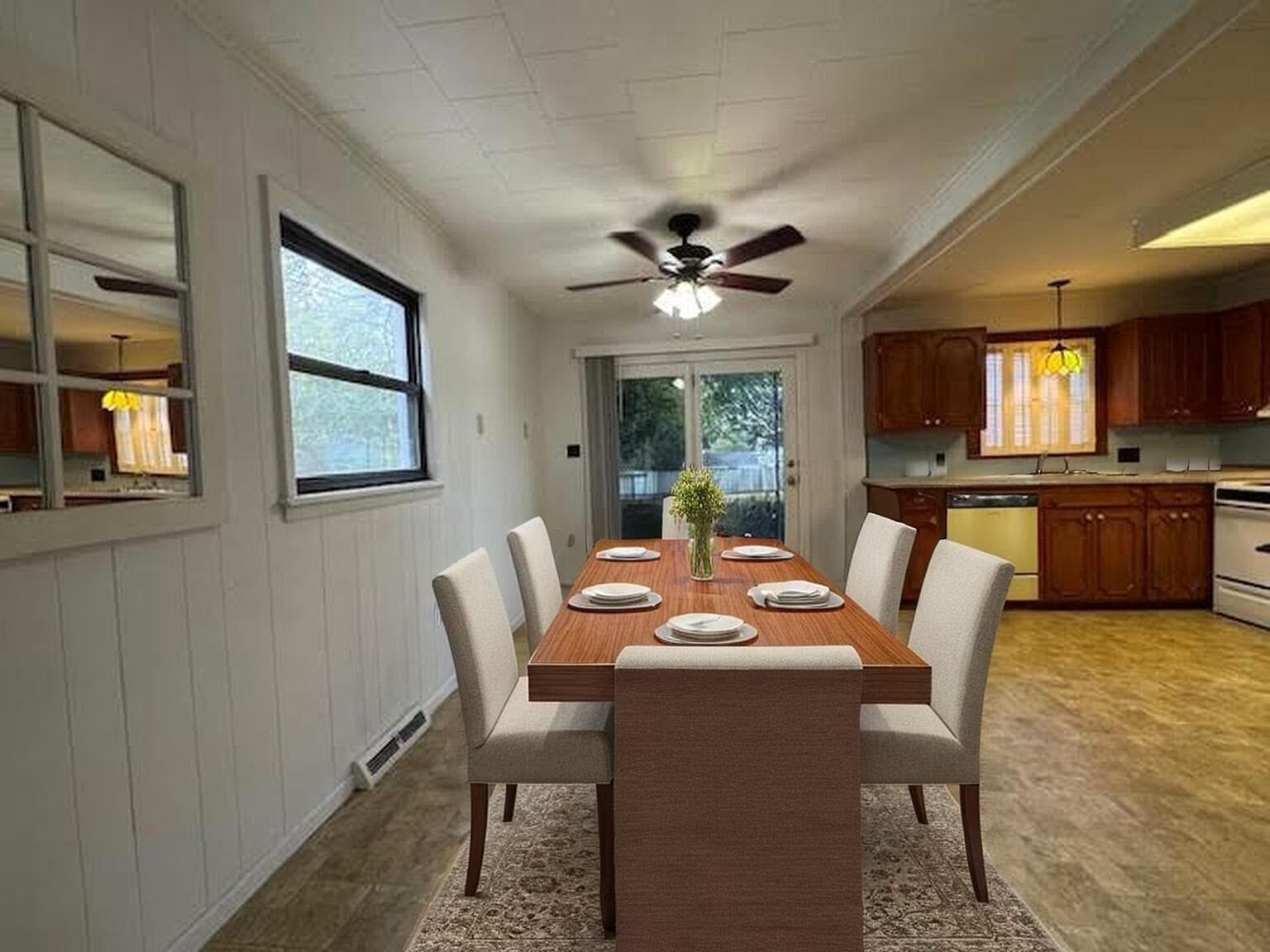 4916 Hildebrand Road Northwest Roanoke, VA 24012 - Photo 4 of 24 a dining room with furniture a window and a kitchen