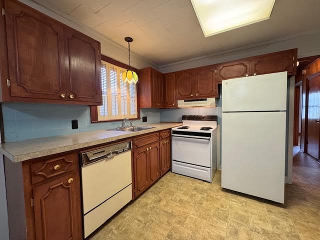4916 Hildebrand Road Northwest Roanoke, VA 24012 - Photo 8 of 24 a kitchen with granite countertop a refrigerator a sink a stove and cabinets