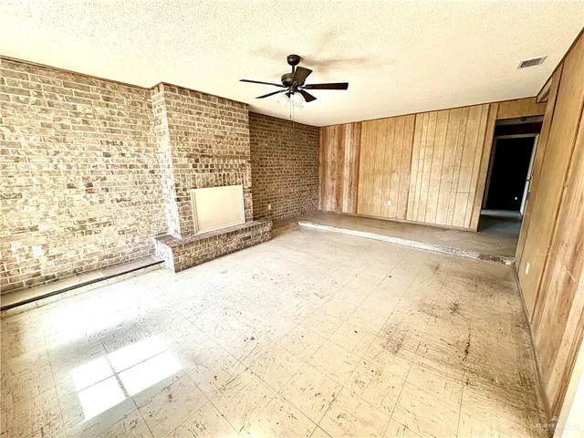 a view of an empty room and window