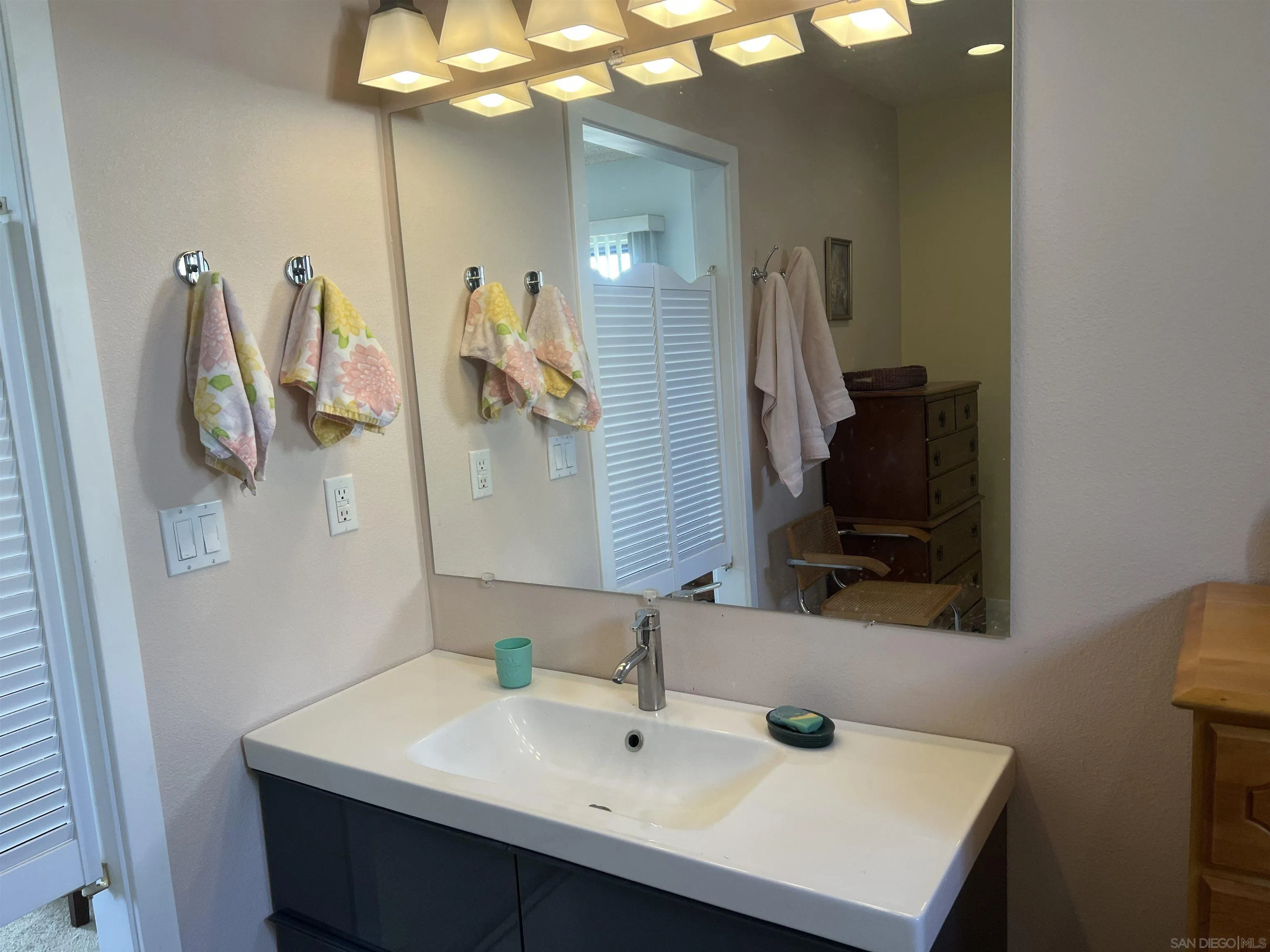3189 Club Circle Borrego Springs, CA 92004 - Photo 15 of 30 a bathroom with a sink vanity and a mirror