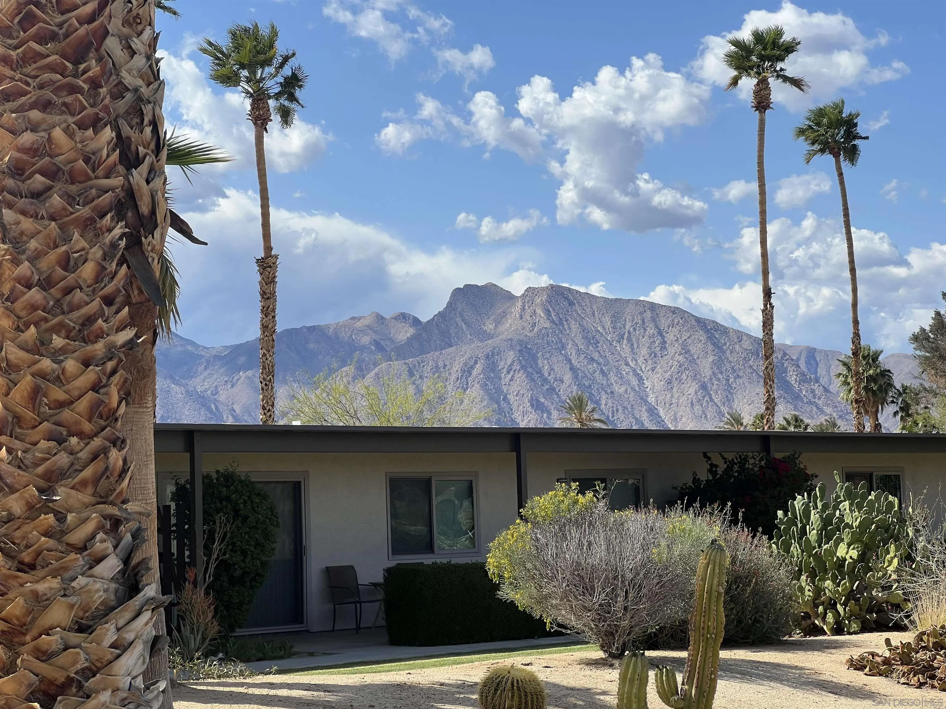 3189 Club Circle Borrego Springs, CA 92004 - Photo 2 of 30 a front view of a house with a garden