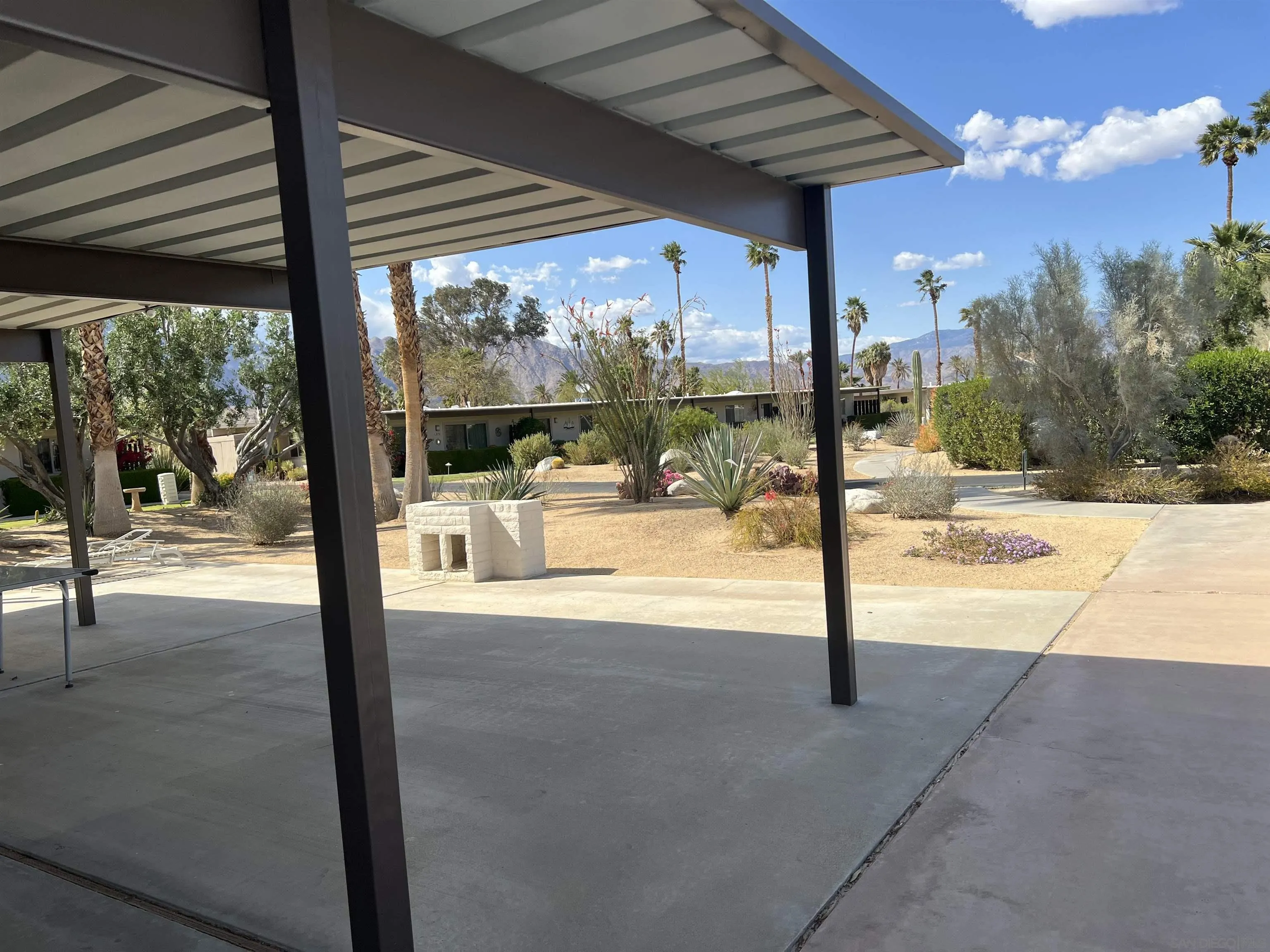 3189 Club Circle Borrego Springs, CA 92004 - Photo 22 of 30 a view of a swimming pool with a patio