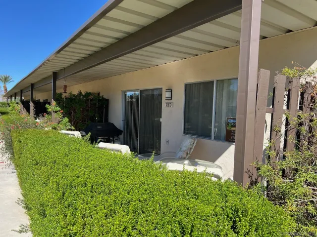 a view of backyard of the house