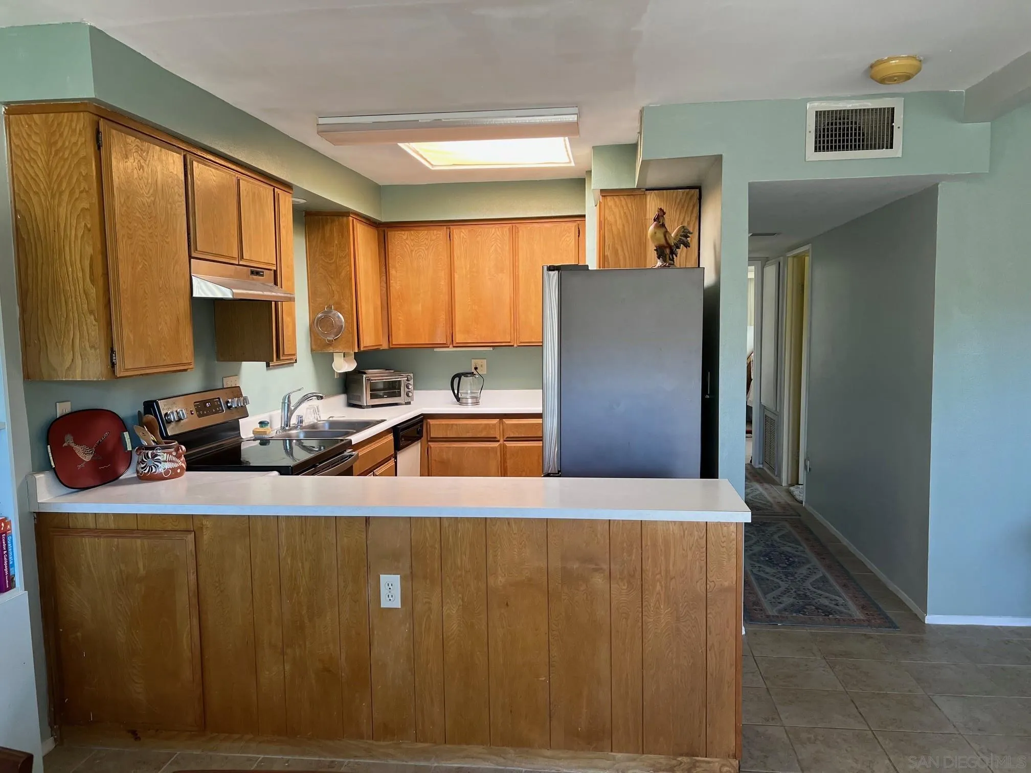 3189 Club Circle Borrego Springs, CA 92004 - Photo 8 of 30 a kitchen with stainless steel appliances granite countertop a refrigerator a stove and a sink