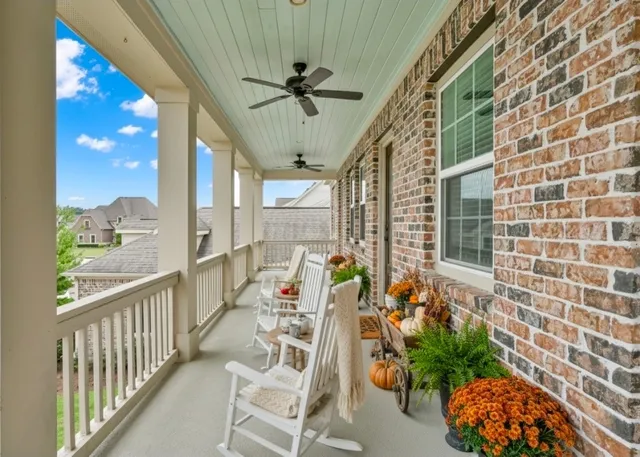 a view of balcony with furniture