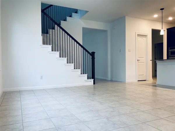 a view of an entryway with stairs