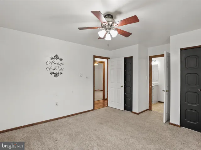 a view of an entryway with a workspace