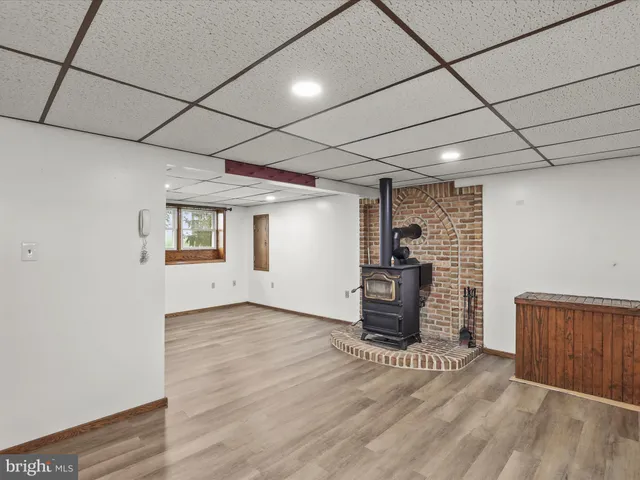 a backyard of a house with wooden fence