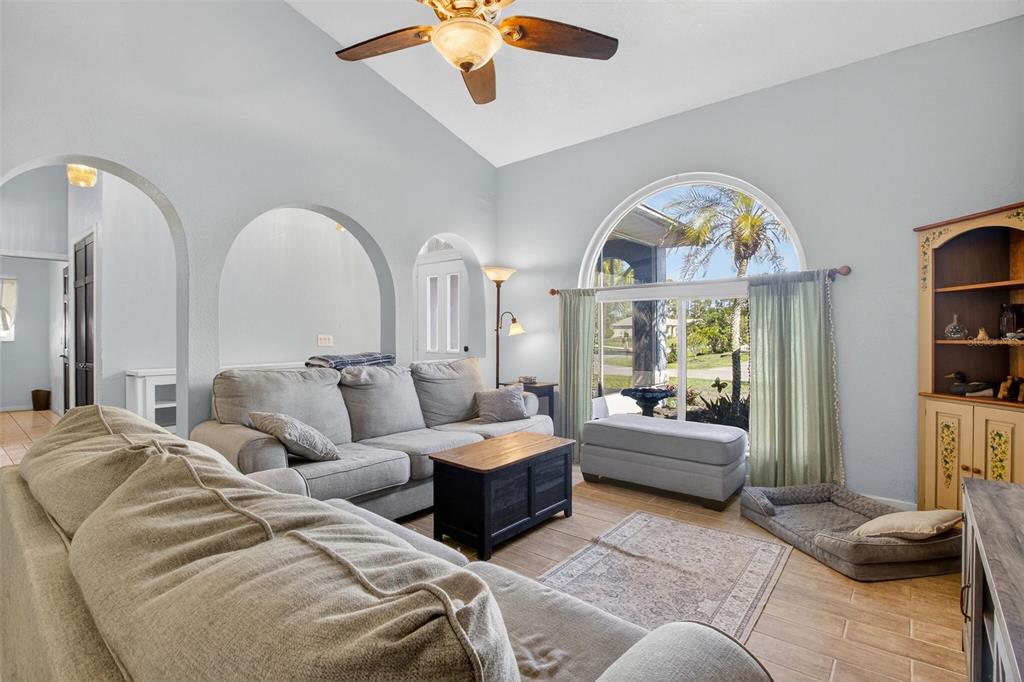 1632 Amstead Street Punta Gorda, FL 33980 - Photo 13 of 50 a living room with furniture and a large window