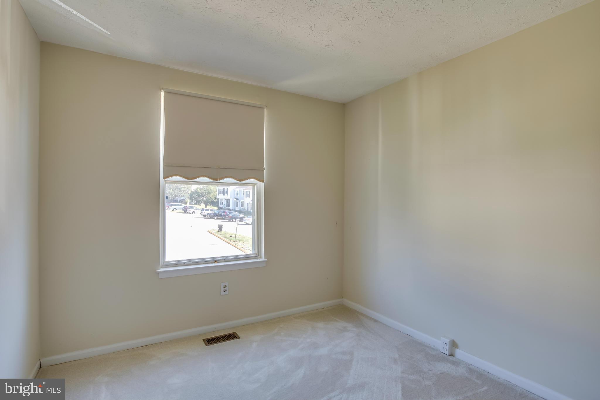 7482 Wounded Knee Road Lorton, VA 22079 - Photo 16 of 29 a room that has a window in it