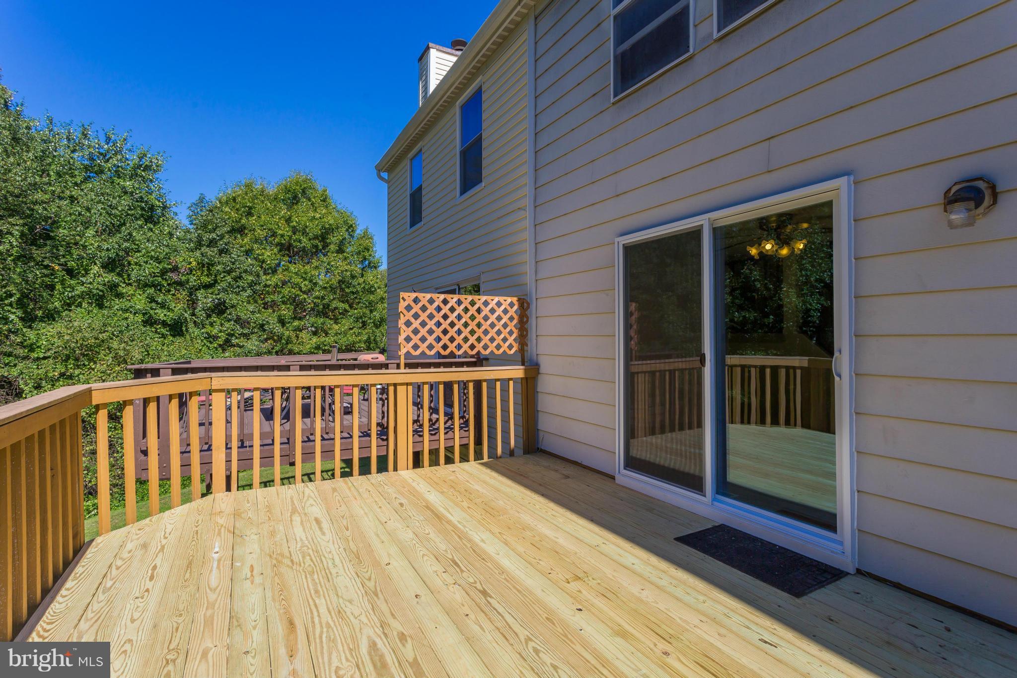 7482 Wounded Knee Road Lorton, VA 22079 - Photo 25 of 29 a view of a wooden deck