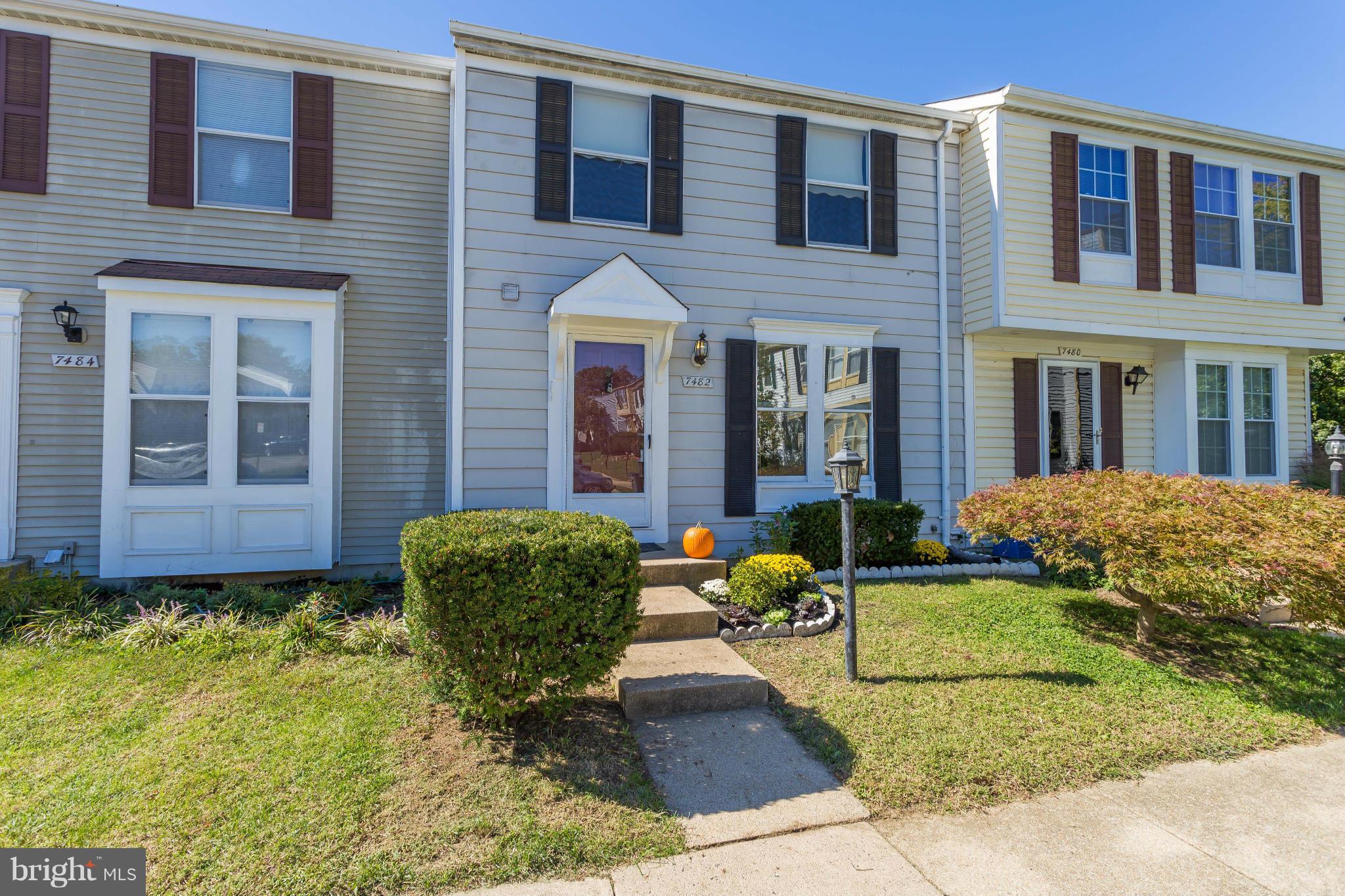 7482 Wounded Knee Road Lorton, VA 22079 - Photo 28 of 29 a front view of a house with garden