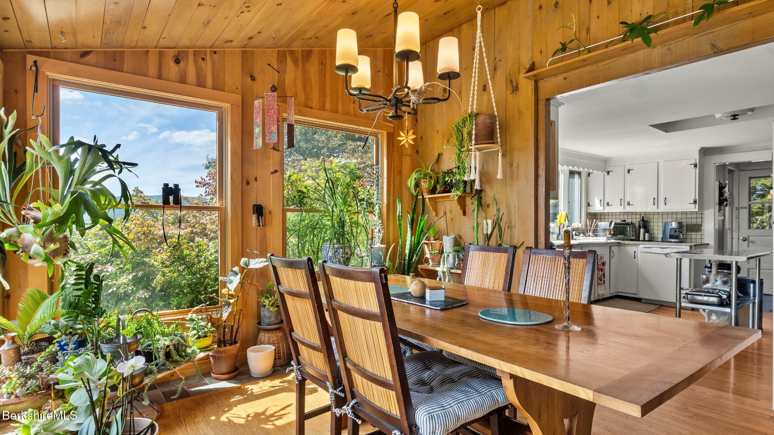 115 Baldwin Hill Road South Egremont, MA 01230 - Photo 15 of 36 a view of a dining room with furniture window and wooden floor