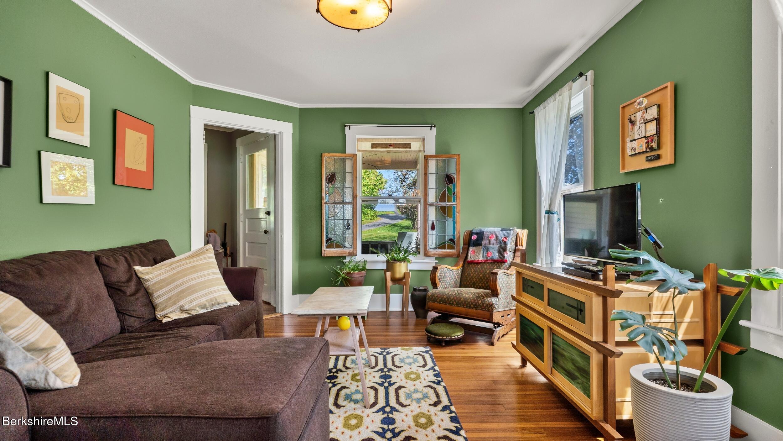 115 Baldwin Hill Road South Egremont, MA 01230 - Photo 20 of 36 a living room with furniture and a flat screen tv