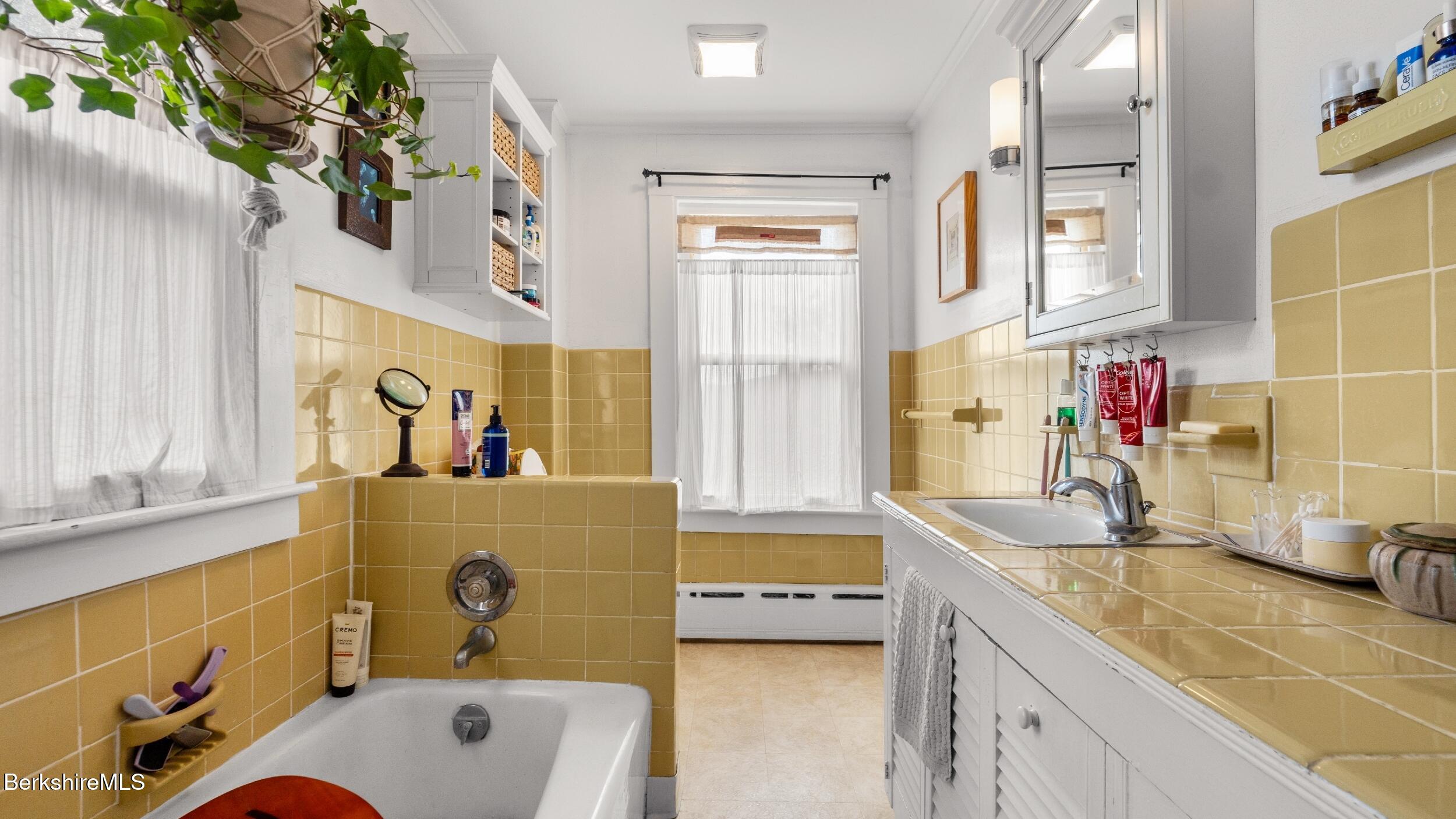 115 Baldwin Hill Road South Egremont, MA 01230 - Photo 33 of 36 a bathroom with a tub sink and mirror