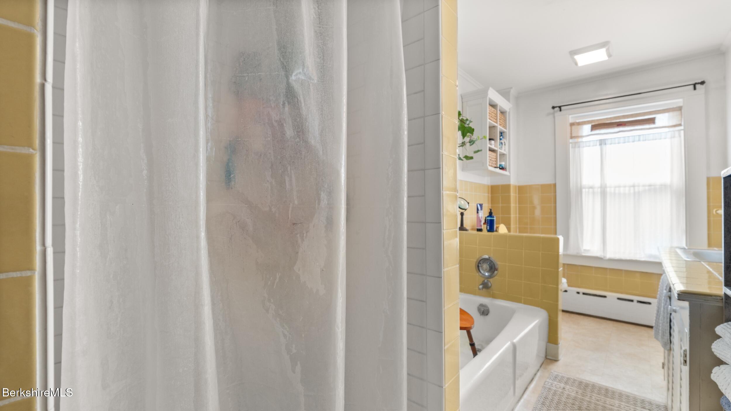 115 Baldwin Hill Road South Egremont, MA 01230 - Photo 34 of 36 a bedroom with a bed and a window