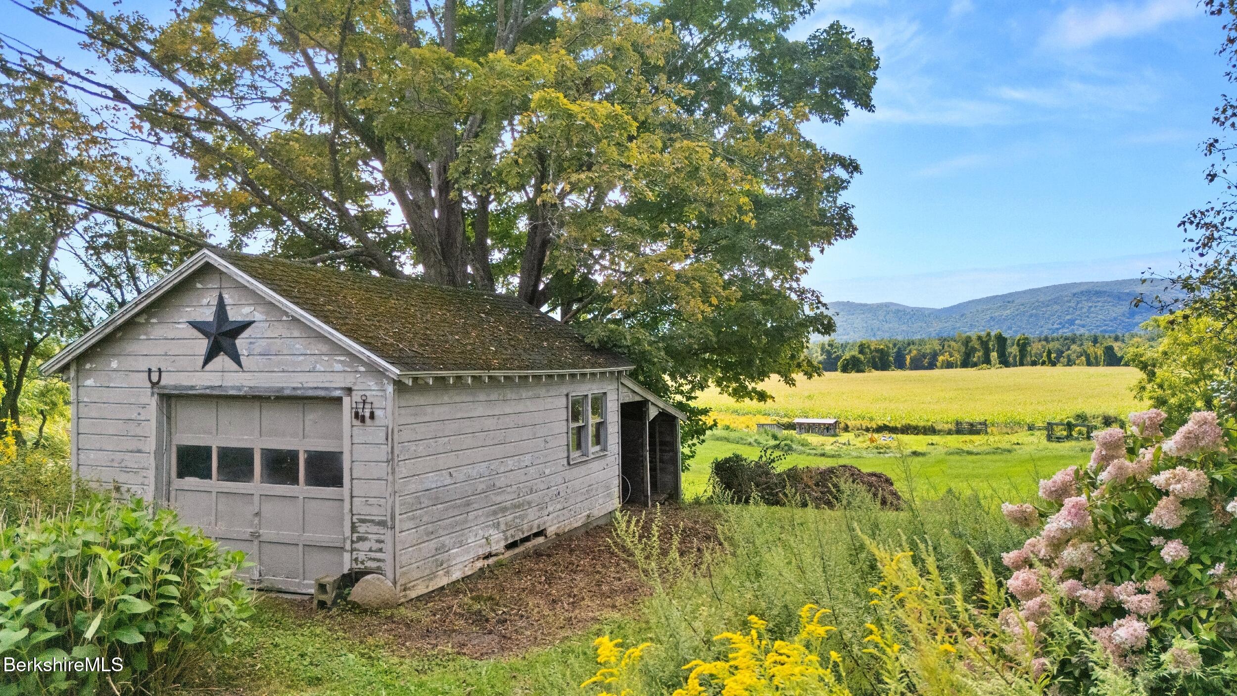 115 Baldwin Hill Road South Egremont, MA 01230 - Photo 5 of 36 a view of a house with a yard