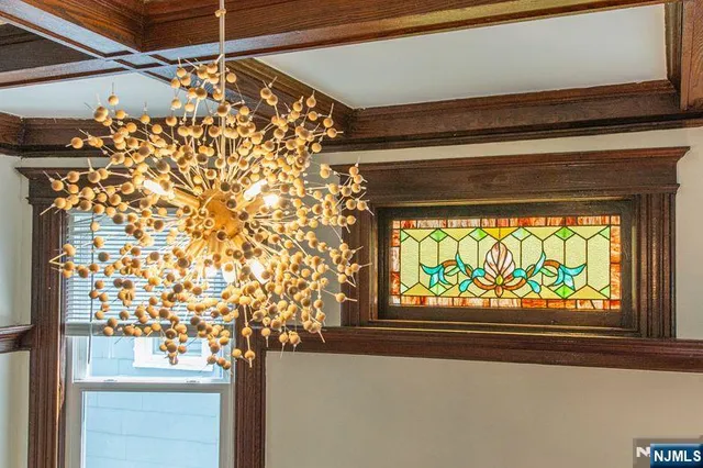 a bedroom with a bed and a table with chair