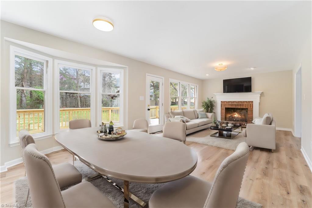 2804 Kings Mill Road Greensboro, NC 27407 - Photo 16 of 50 Kitchen dining/sitting room virtually staged