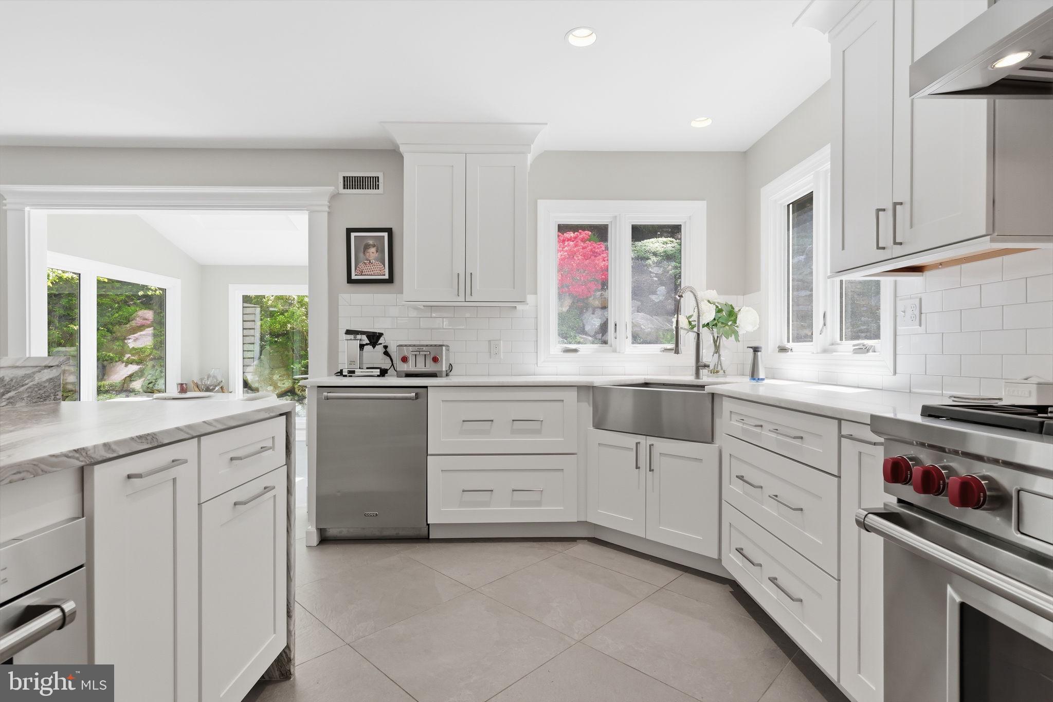 4757 Upper Mountain Road New Hope, PA 18938 - Photo 22 of 70 a kitchen with white cabinets and white appliances