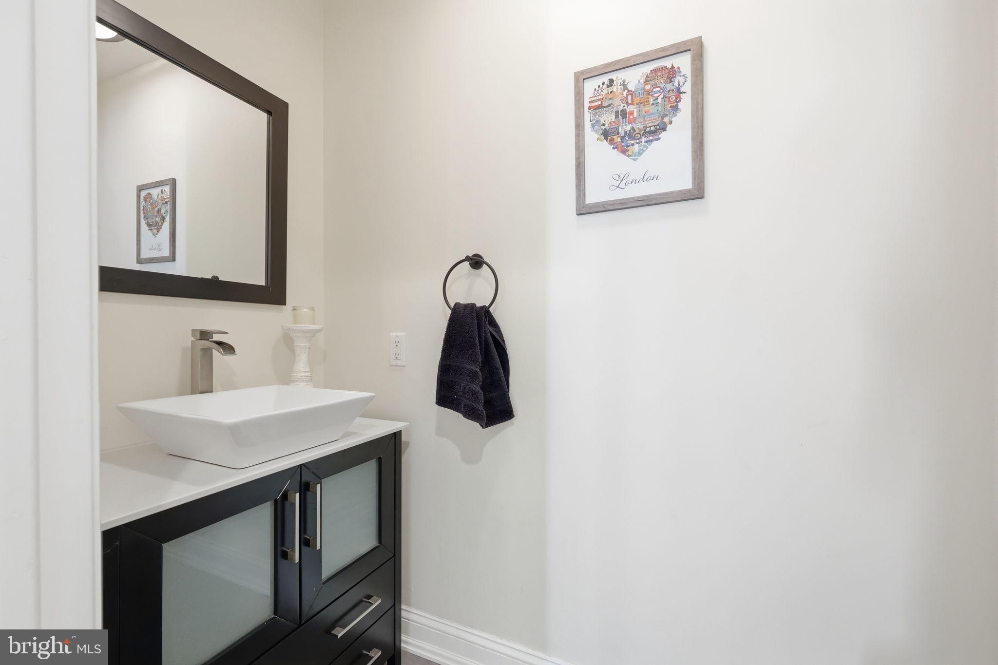 4757 Upper Mountain Road New Hope, PA 18938 - Photo 26 of 70 a bathroom with a sink and a mirror