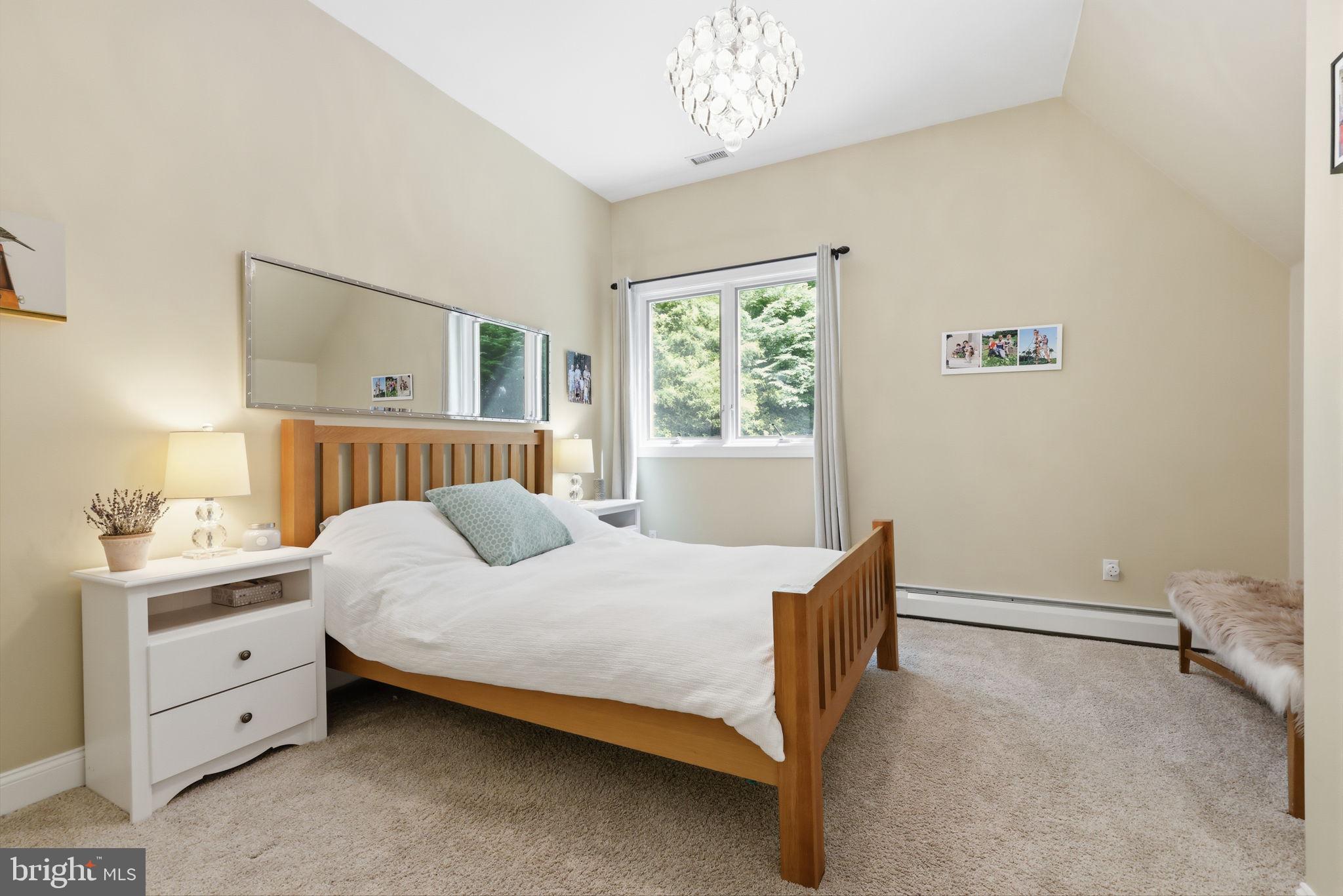 4757 Upper Mountain Road New Hope, PA 18938 - Photo 33 of 70 a bedroom with a bed and a window