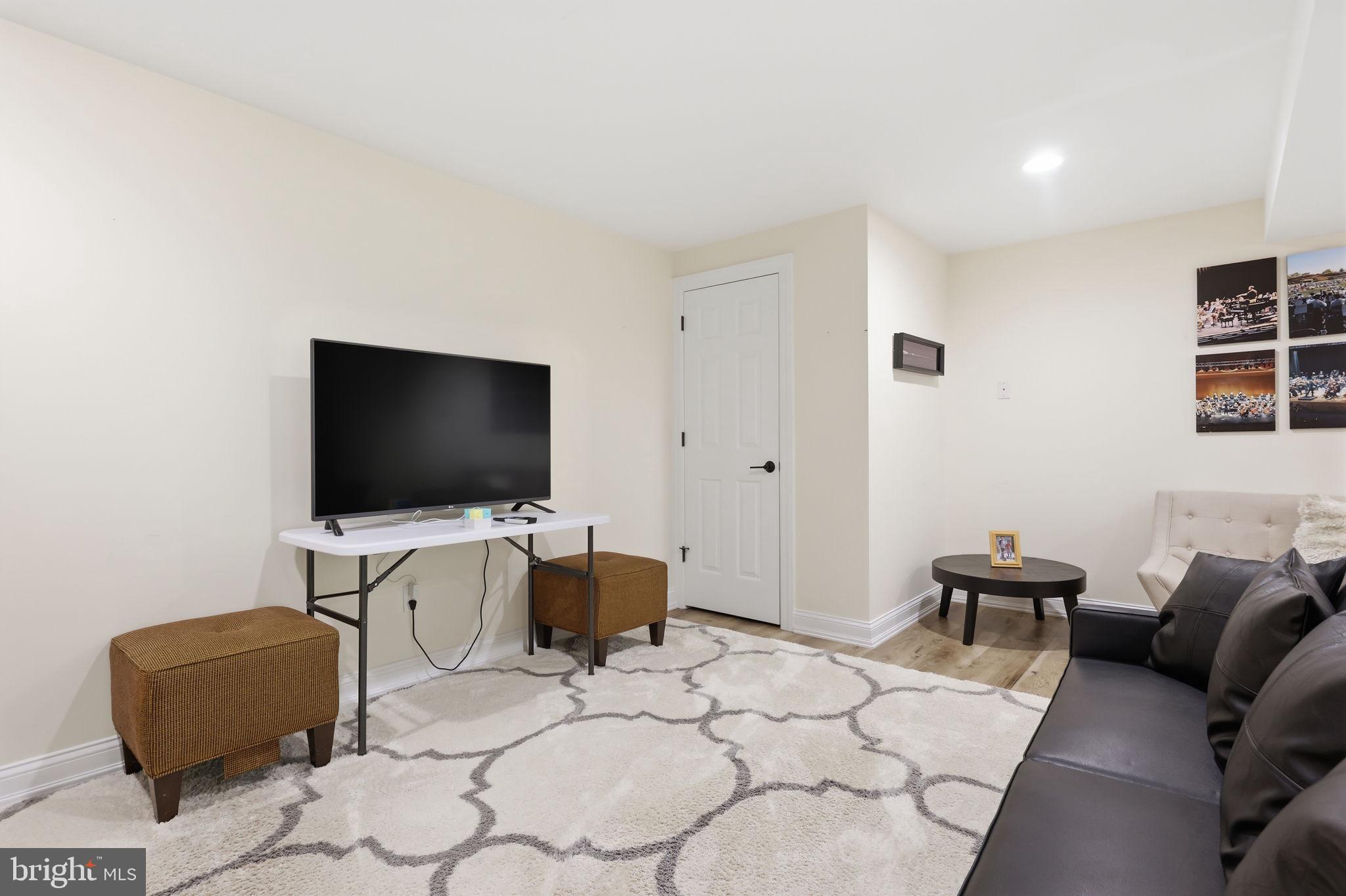 4757 Upper Mountain Road New Hope, PA 18938 - Photo 48 of 70 a bedroom with a bed and a flat screen tv