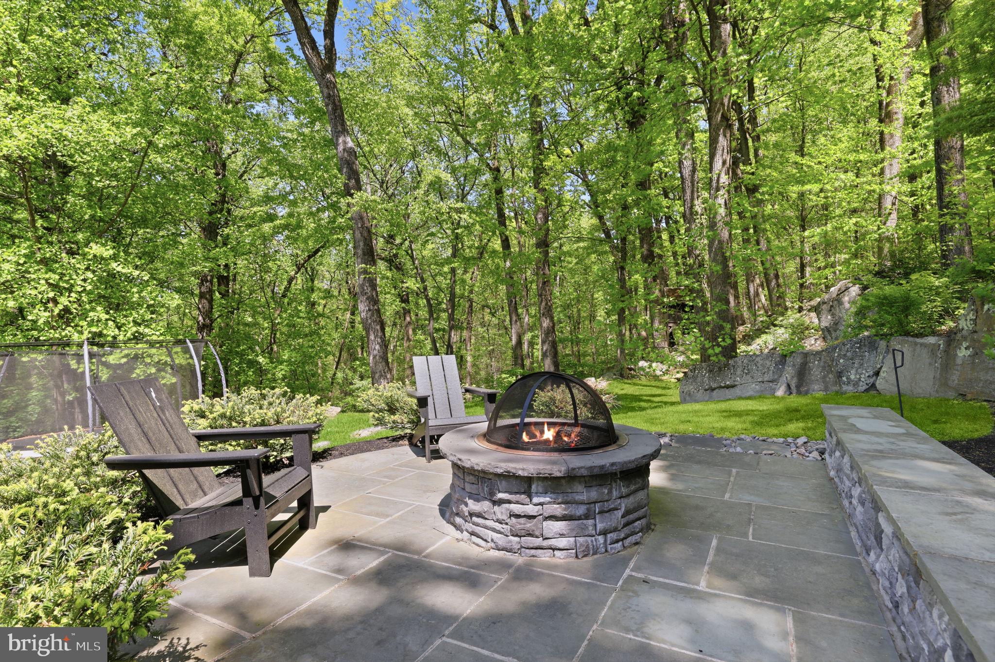 4757 Upper Mountain Road New Hope, PA 18938 - Photo 57 of 70 a view of a backyard with sitting area and garden