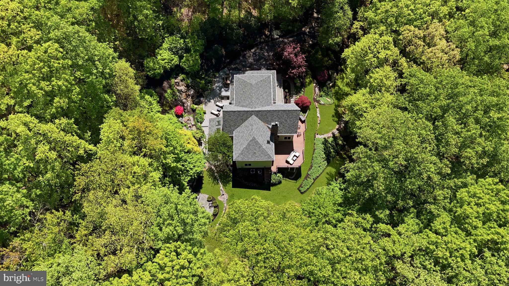 4757 Upper Mountain Road New Hope, PA 18938 - Photo 66 of 70 an aerial view of a house with a yard and garden