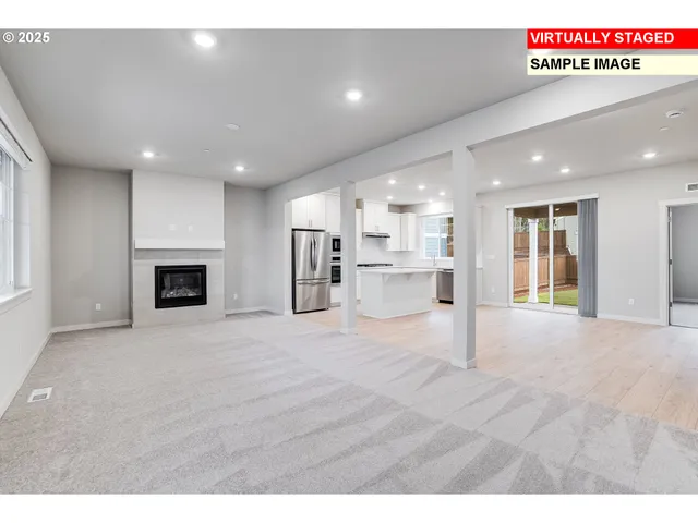 a view of a kitchen with a sink