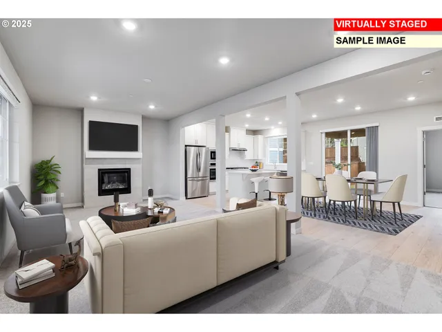 a living room with furniture a flat screen tv and a dining table