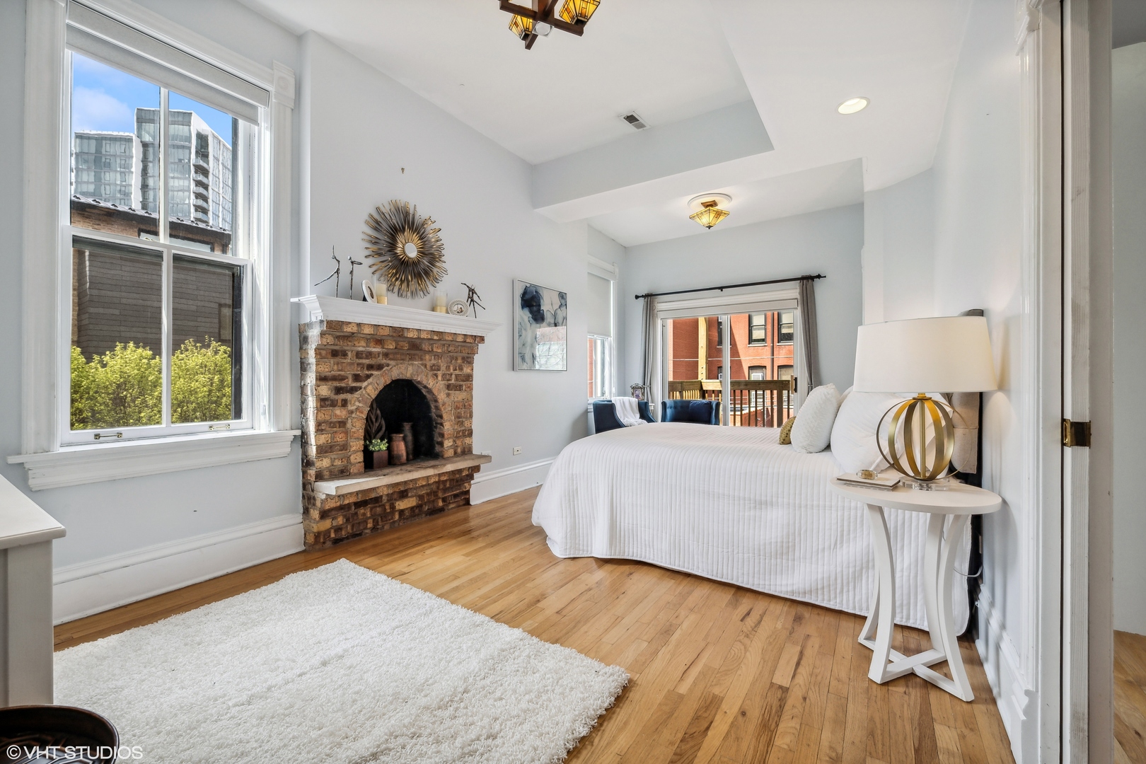 626 West Belden Avenue, Unit 2 Chicago, IL 60614 - Photo 12 of 17 a living room with furniture and a fireplace