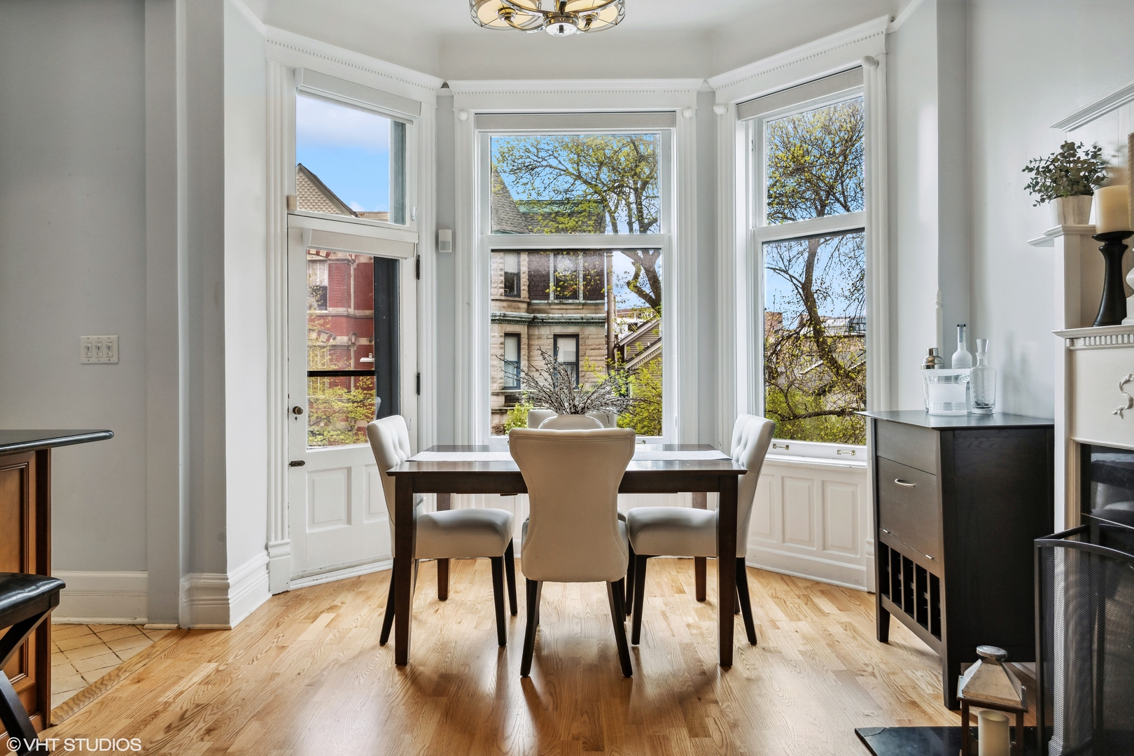 626 West Belden Avenue, Unit 2 Chicago, IL 60614 - Photo 3 of 17 a view of a dining room with furniture window and outside view